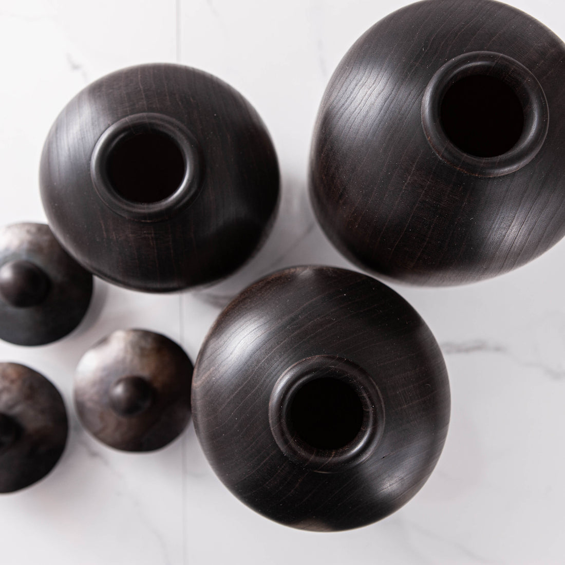 SET OF THREE LIDDED VESSELS IN EBONIZED CHERRY AND WAXED STEEL